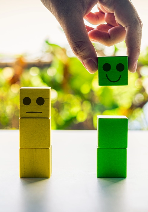 Behaviour change concept with colourful emotion blocks